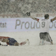 Clint Dempsey of the US asks for a call as Costa Rica’s Michael Barrantes rolls in the snow.